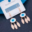 Stainless Steel Feather Evil Eye Rose Gold Dangle Earring Pair Bulk