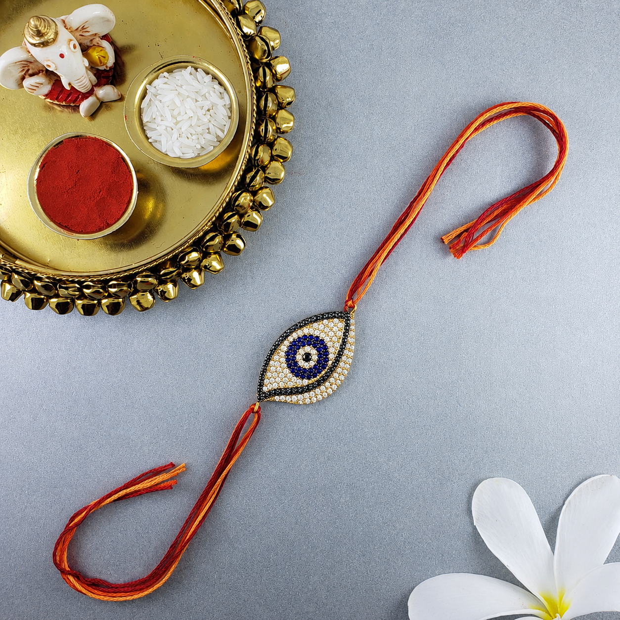 Designer Oval Evil Eye Black CZ Red Orange Thread Rakhi For Men Bulk