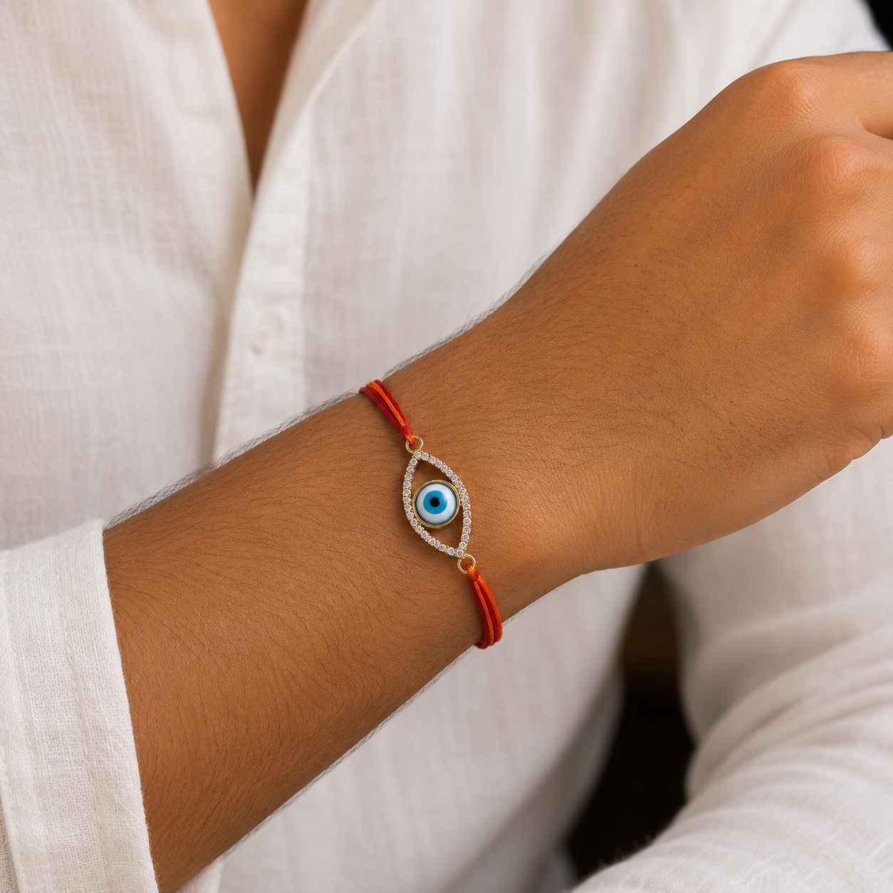 Oval Evil Eye Gold Plated CZ Red Orange Thread Rakhi For Men Wholesale