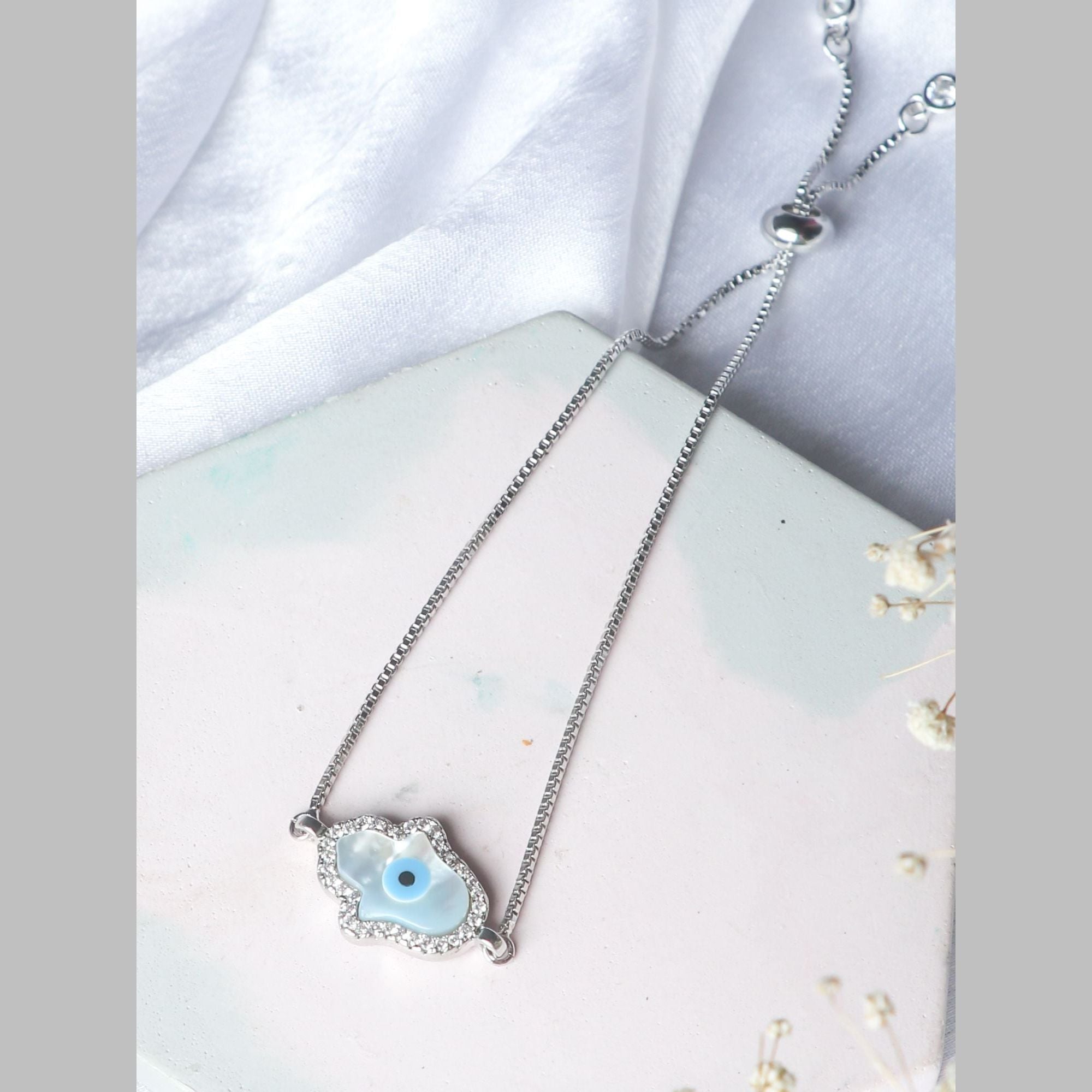 Silver Blue Evil Eye Nazariya Hamsa Hand Mother Of Pearl Cubic Zirconia American Diamond Bracelet Main image