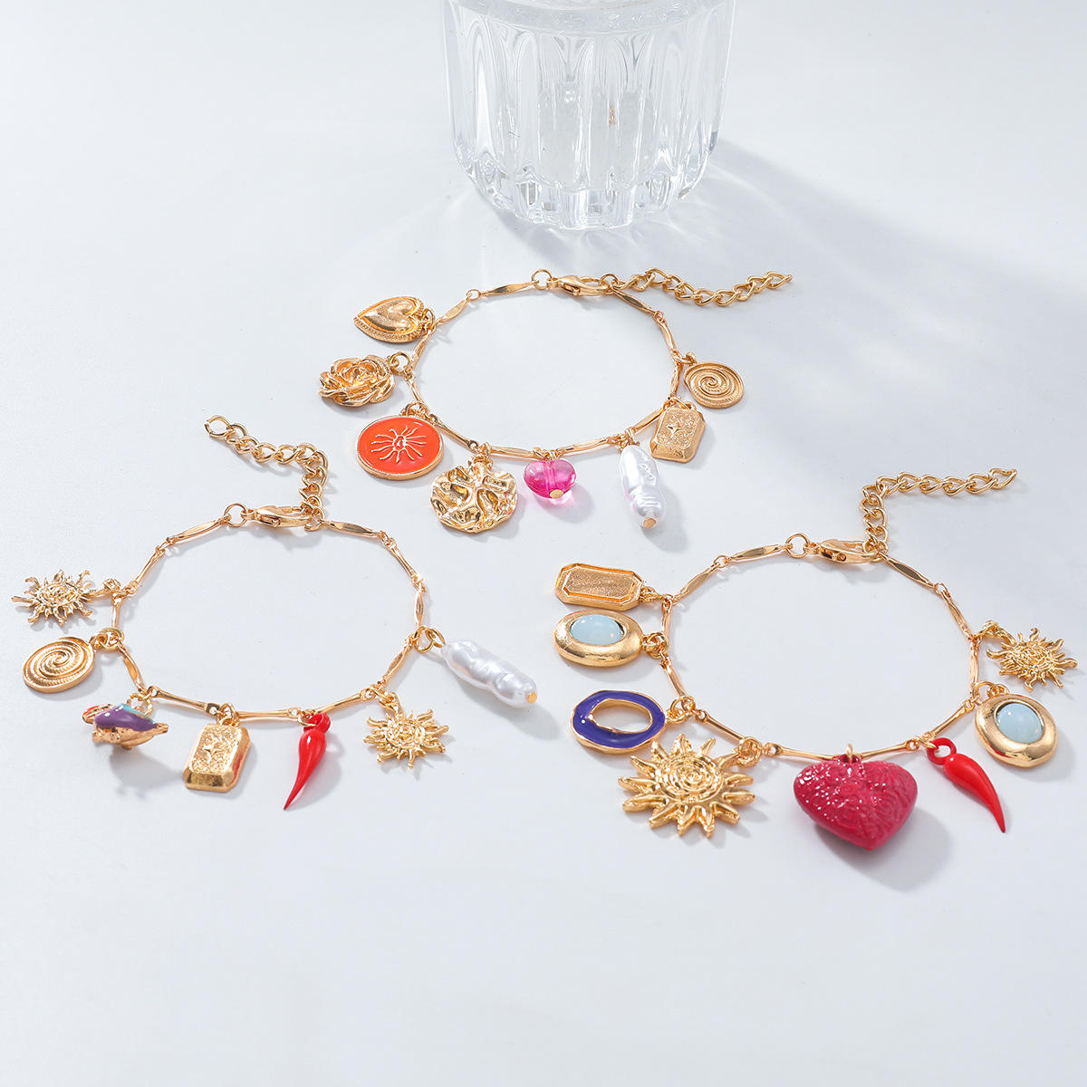 Heart Sun Pearl Enamel Gold Multilayer Charm Bracelet Pack Of 3 Bulk Main image