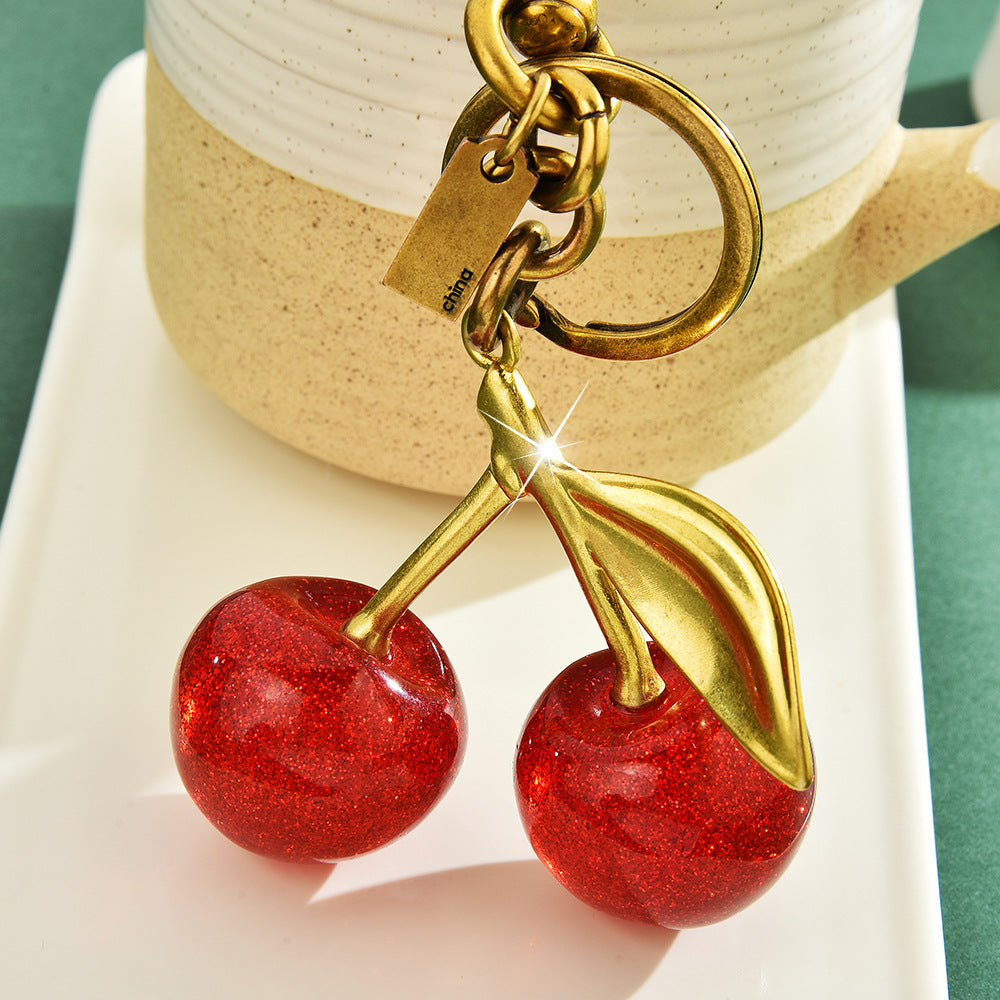 Cherry Antique Gold Plated Red Glitter Acrylic Keychain For Women Secondary image