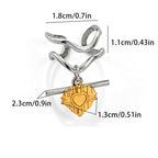 Silver stainless steel heart-shaped charm with a wavy top loop and a gold-plated heart pendant, shown with dimension labels and text specifying color as 18K Gold and material as Stainless Steel.