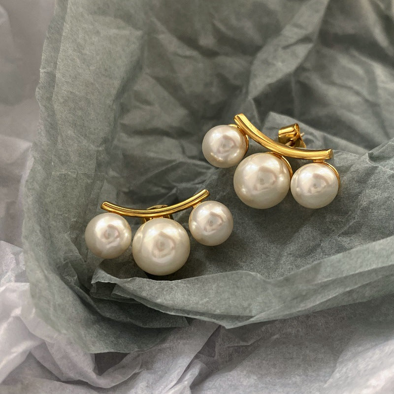 White Modern Arc Style Gold Plated Pearl Copper Stud Earrings Wholesale