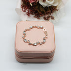 Elegant Rose Gold Bracelet With Red Crystals And Green Leaves Bulk
