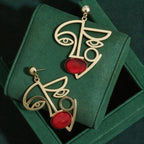 Red Abstract face Gold Plated Dangler Earrings For Women Bulk