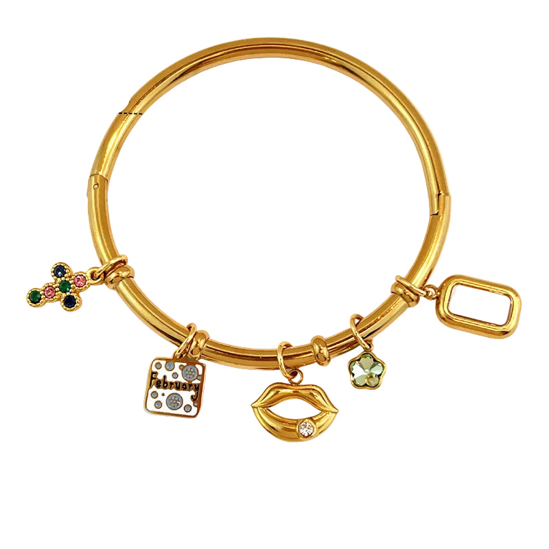 Gold-plated stainless steel bangle bracelet with multiple charms, including a rhinestone-embellished square, a gold lips charm, a green flower charm, and a tricolor charm, shown with dimension markings of 6.0cm width and 0.
