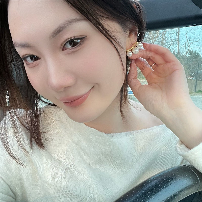 White Modern Arc Style Gold Plated Pearl Copper Stud Earrings Wholesale