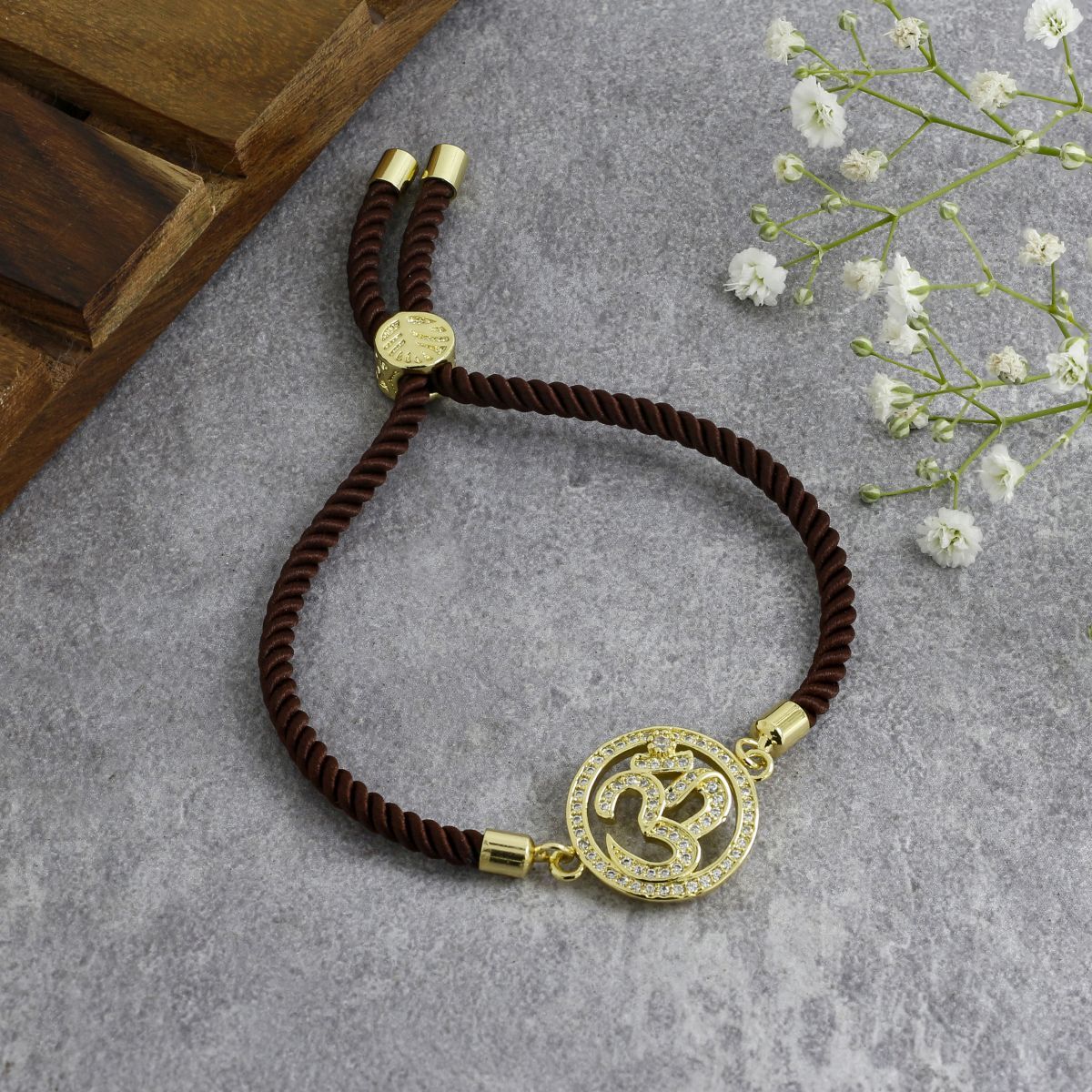 Aum Om 18K Gold Brown American Diamond Adjustable Thread Bracelet Main image