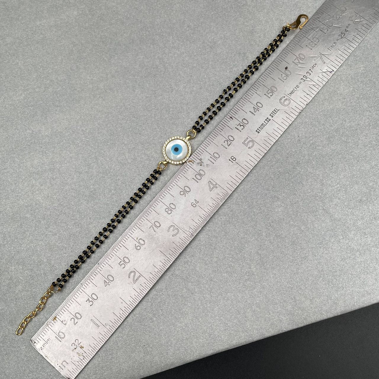 Evil Eye Nazariya Mother Of Pearl Zircon American Diamond Charm Hand Haath Mangalsutra Bracelet For Women