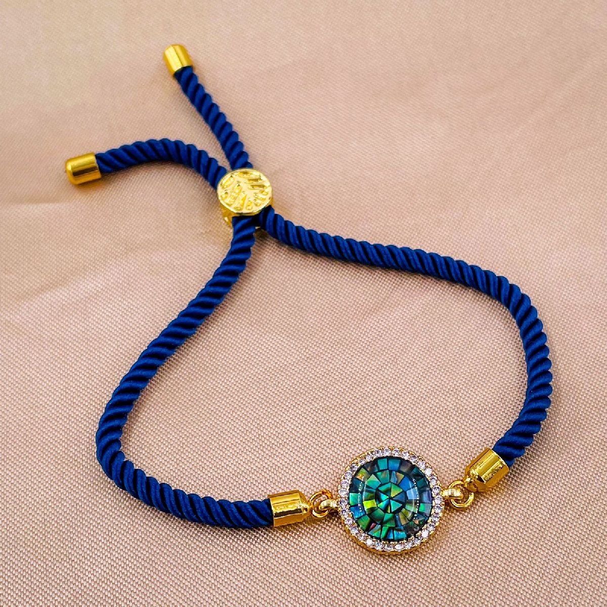 Round American Diamond Gold Blue Thread Bracelet For Women Bulk Main image