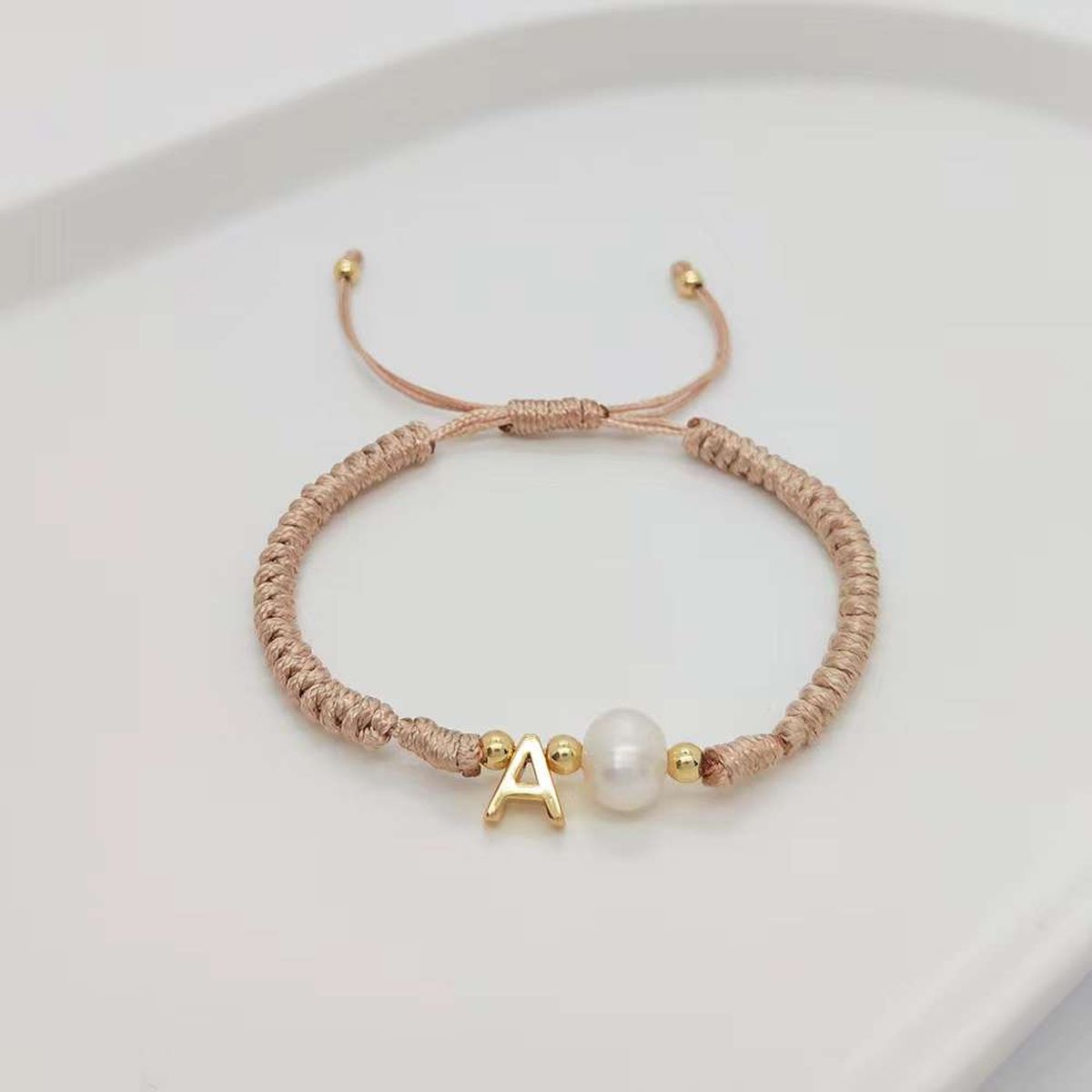 A Personalised Letter Alphabet Initial Pearl Braided Beige Rope Adjustable Thread Bracelet Secondary image