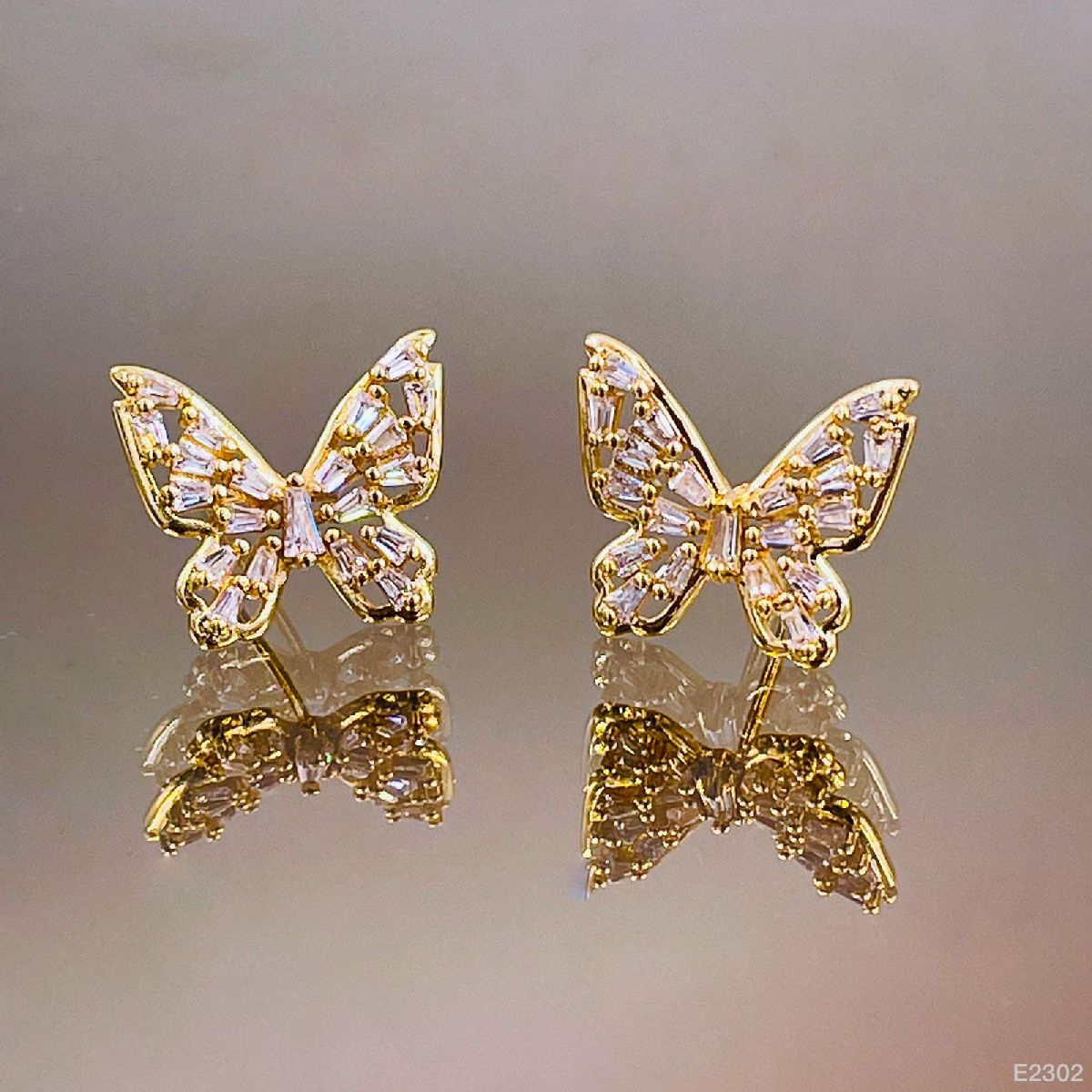 Butterfly Baguette Cubic Zirconia Gold Copper Stud Earring Pair Bulk Main image
